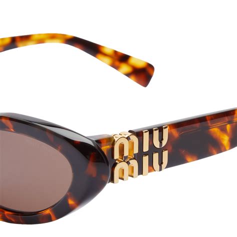 Miu Miu Women's Fashion 54mm Honey Havana Sunglasses.